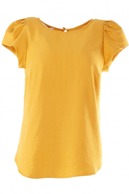 Блузка гірчичного кольору,з круглою горловиною. Діловий жіночий одяг фото.