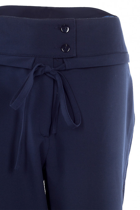 Купити штани сині звужені з пояском. Діловий жіночий одяг фото