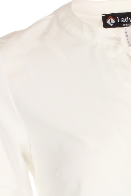 Блузка жемчужного кольору Діловий жіночий одяг фото