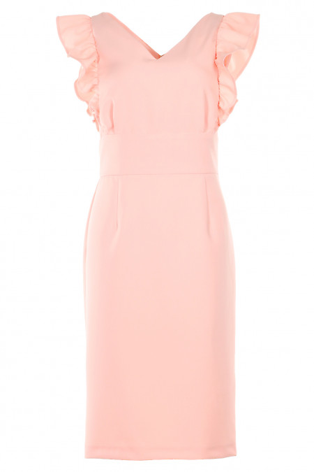 Сукня чохол персикового кольору. Діловий жіночий одяг фото