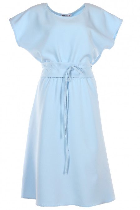 Сукня блакитного кольору на резинці. Діловий жіночий одяг фото