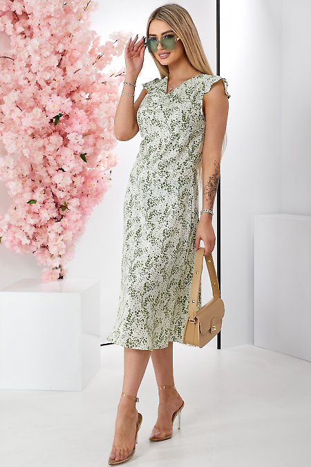Біле плаття в зелені квіти. Діловий жіночий одяг фото