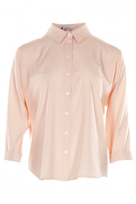 Блузка персиковая оверсайз с манжетой на рукавах. Деловая женская одежда фото