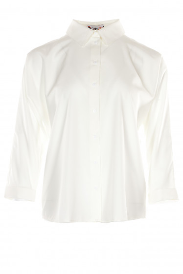 Блузка белая оверсайз с манжетой на рукавах. Деловая женская одежда фото