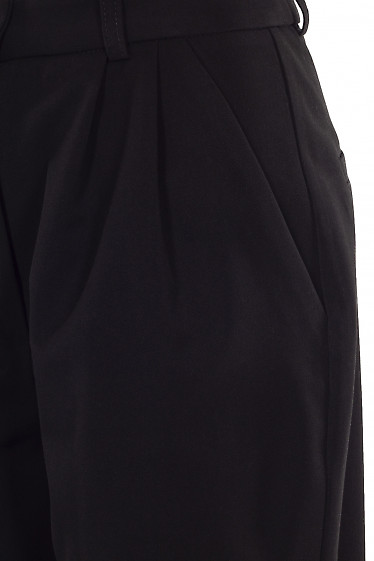 Штани чорні утеплені з манжетою. Діловий жіночий одяг фото